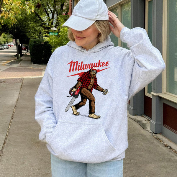 Bigfoot With Chainsaw Hoodie | Funny Sasquatch Graphic Sweatshirt | Premium Cotton-Blend | Gift For Tool Enthusiasts And Cont