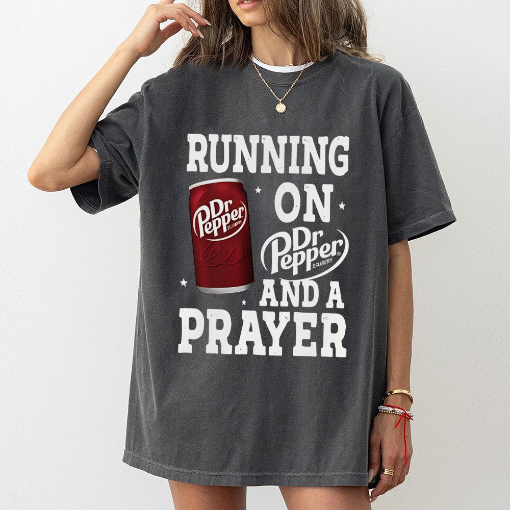 Running On Soda And A Prayer Graphic T-Shirt | Funny Caffeine Lover Quote | Premium Soft Cotton | Gift For Soda Addicts And C